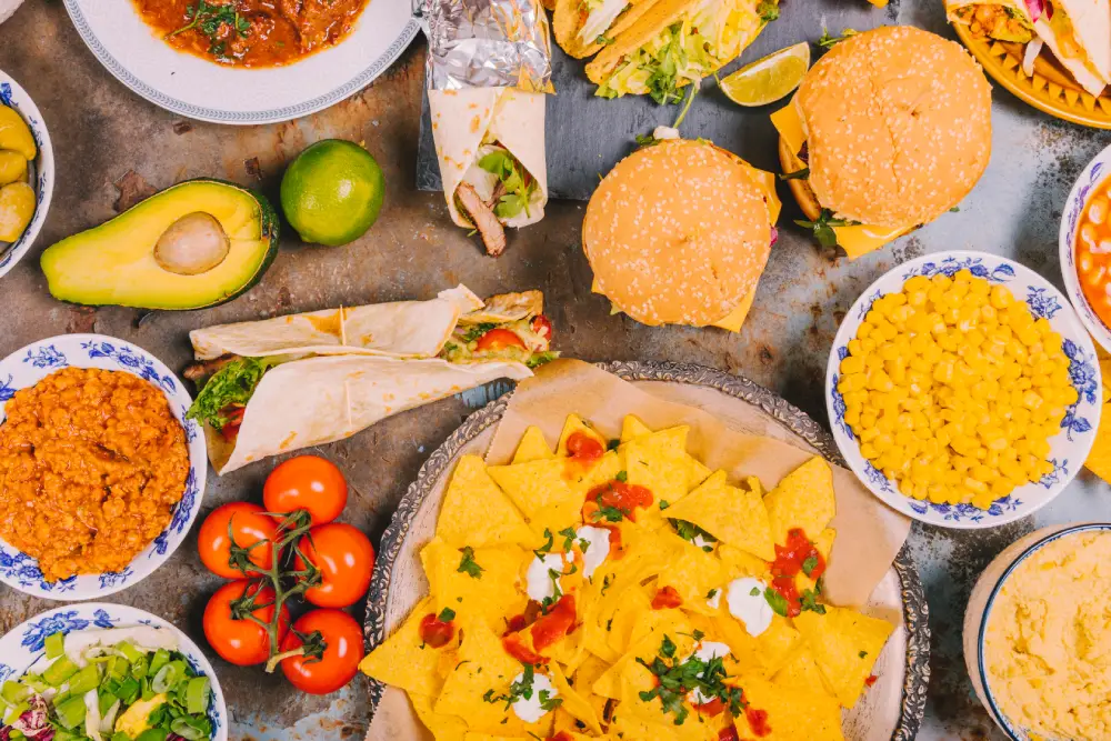 top-view-different-mexican-dishes-old-weathered-background